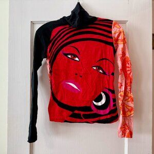 Custo Barcelona | Vintage Bold Woman's Face Graphic Turtleneck